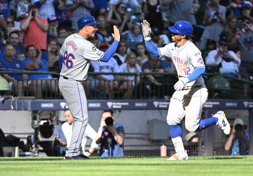 Sep 29, 2024; Milwaukee, Wisconsin, USA;New York Mets shortstop Francisco Lindor (12) is congratulated by New York Mets