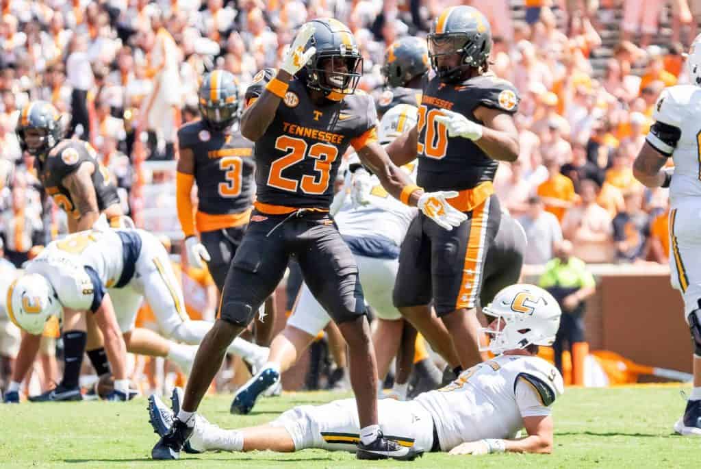 Tennessee defensive back Boo Carter (23) celebrates after sacking Chattanooga quarterback Chase Artopoeus (9) during