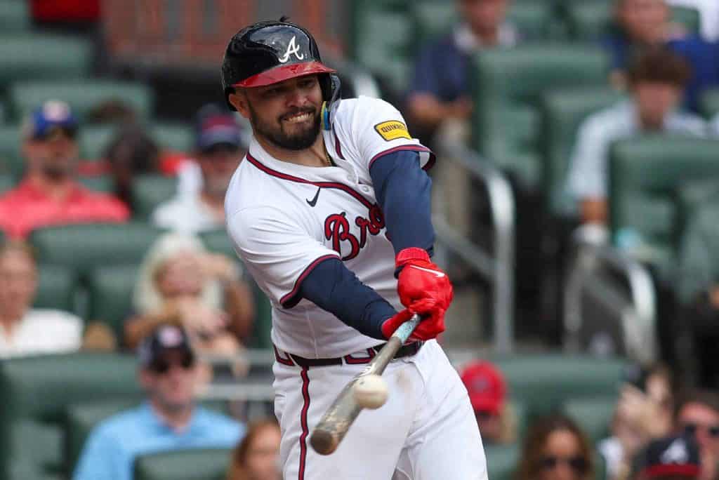 Sep 30, 2024; Atlanta, Georgia, USA; Atlanta Braves catcher Travis d’Arnaud (16) hits a single against the New York Mets in
