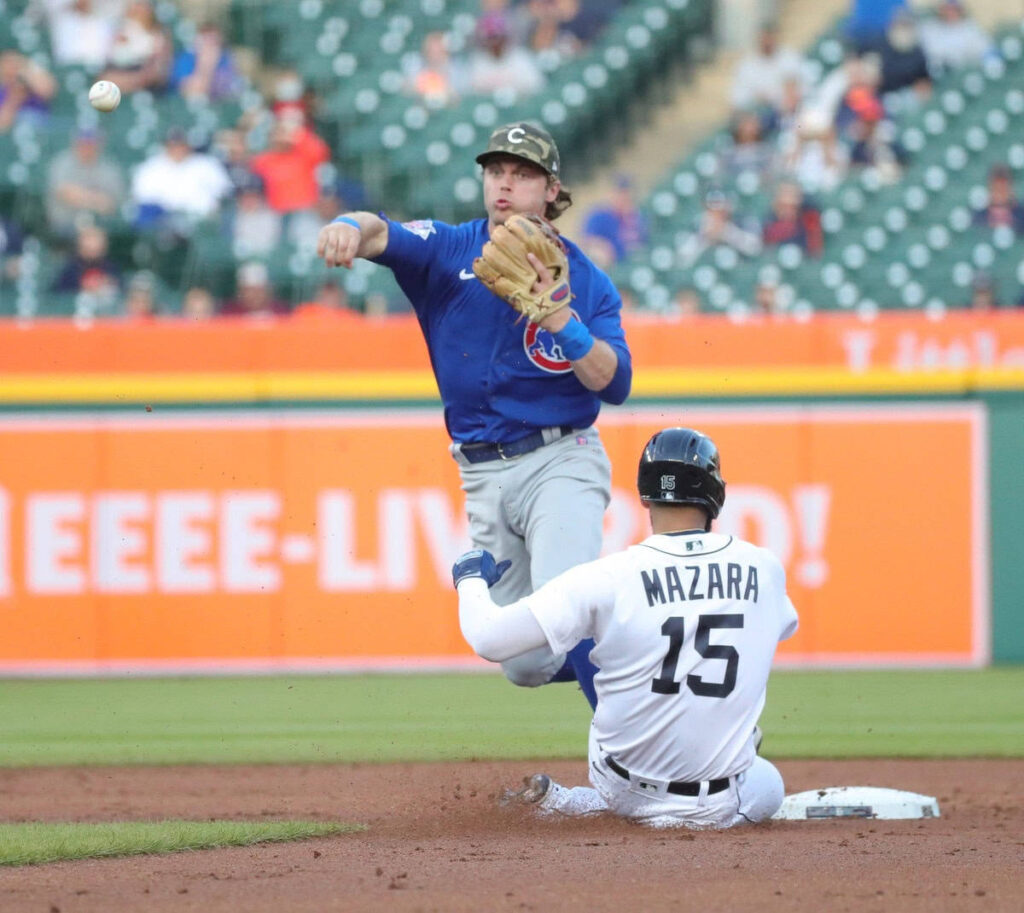 Detroit Tigers right fielder Nomar Mazara (15) is forced out by second baseman Nico Horner (2) during second inning action