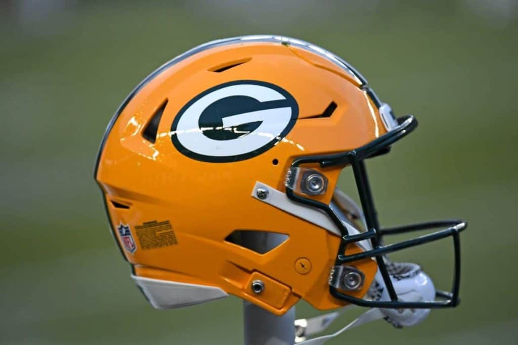 Green Bay Packers Dontayvion Wicks and Sean Rhyan, Bo Melton, Matt LaFleur, Emanuel Wilson, Mark McNamee, Bo Melton