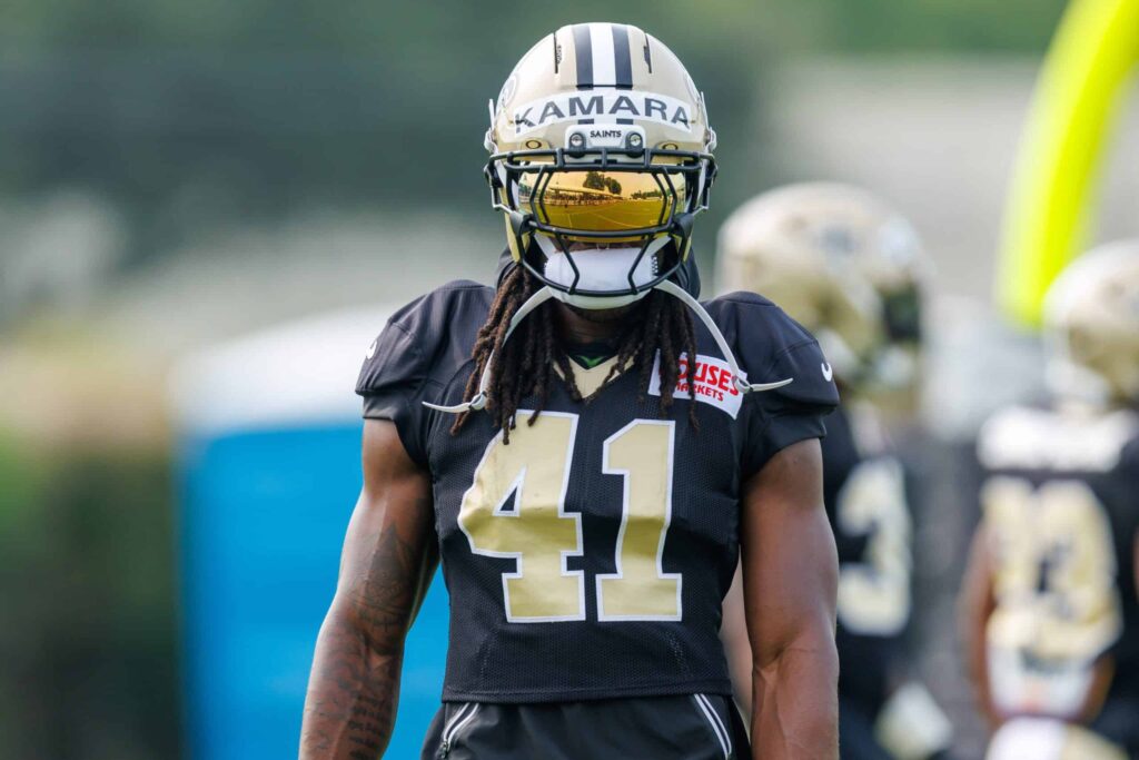 Saints running back Alvin Kamara at 2025 training camp; his role grows after the Travis Etienne injury