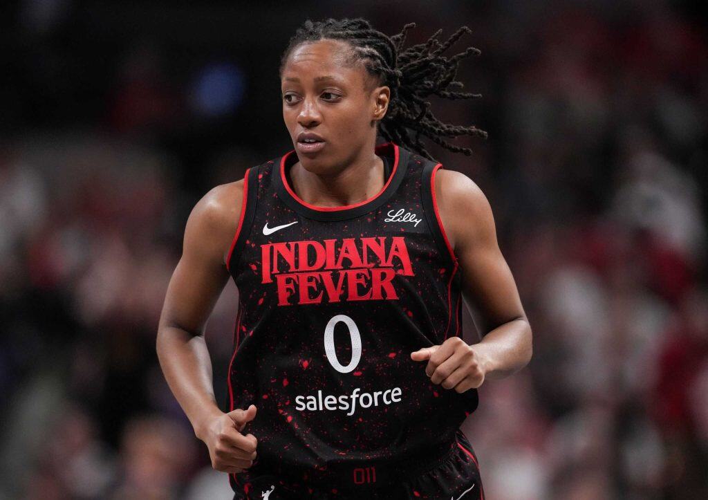 Indiana Fever guard Kelsey Mitchell (0) rushes up the court Tuesday, Aug. 12, 2025, during the game at Gainbridge Fieldhouse