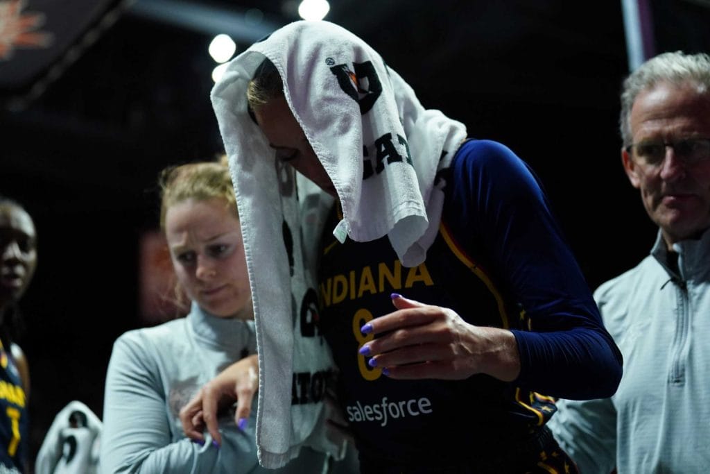 Sophie Cunningham leaves the Court after knee injury