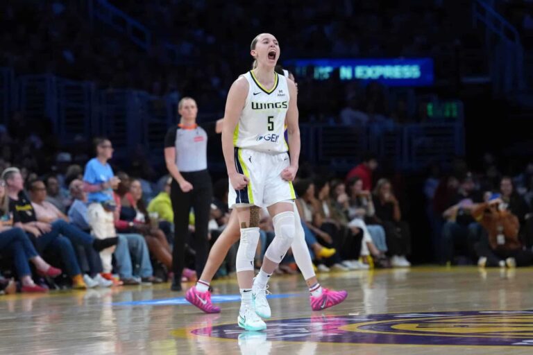 Dallas Wings guard Paige Bueckers celebrates against the LA Sparks in 2025, ahead of Wings vs. Valkyries Game 3