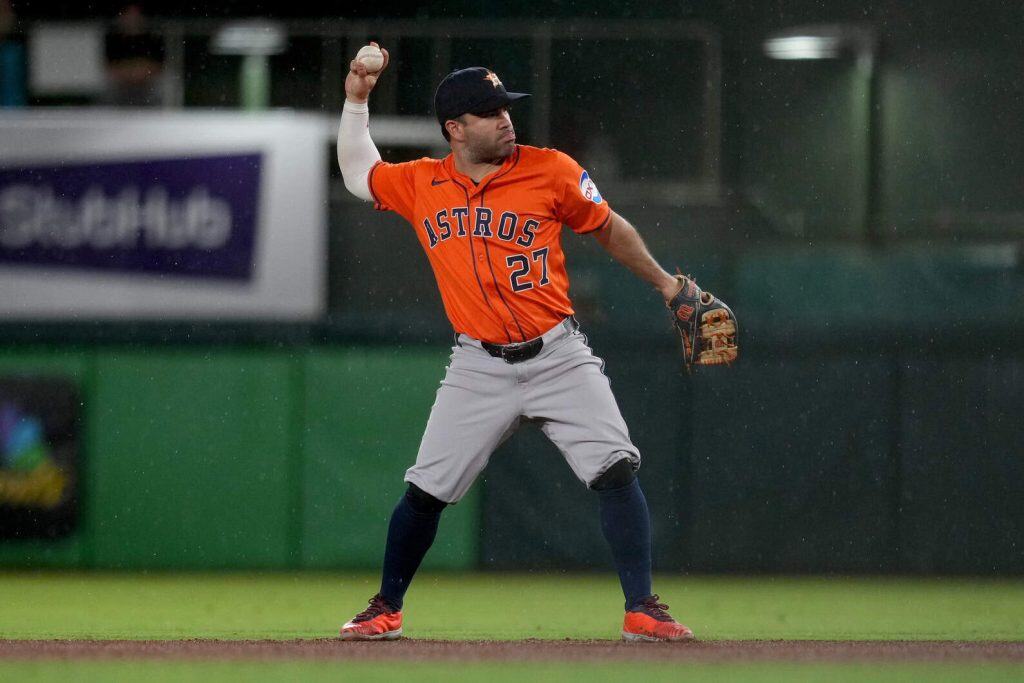 Astros second baseman Jose Altuve, one shy of the postseason home run record, throws to first against the Athletics in September 2025