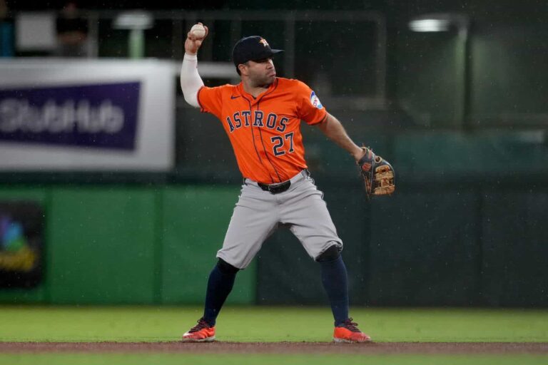Astros second baseman Jose Altuve, one shy of the postseason home run record, throws to first against the Athletics in September 2025