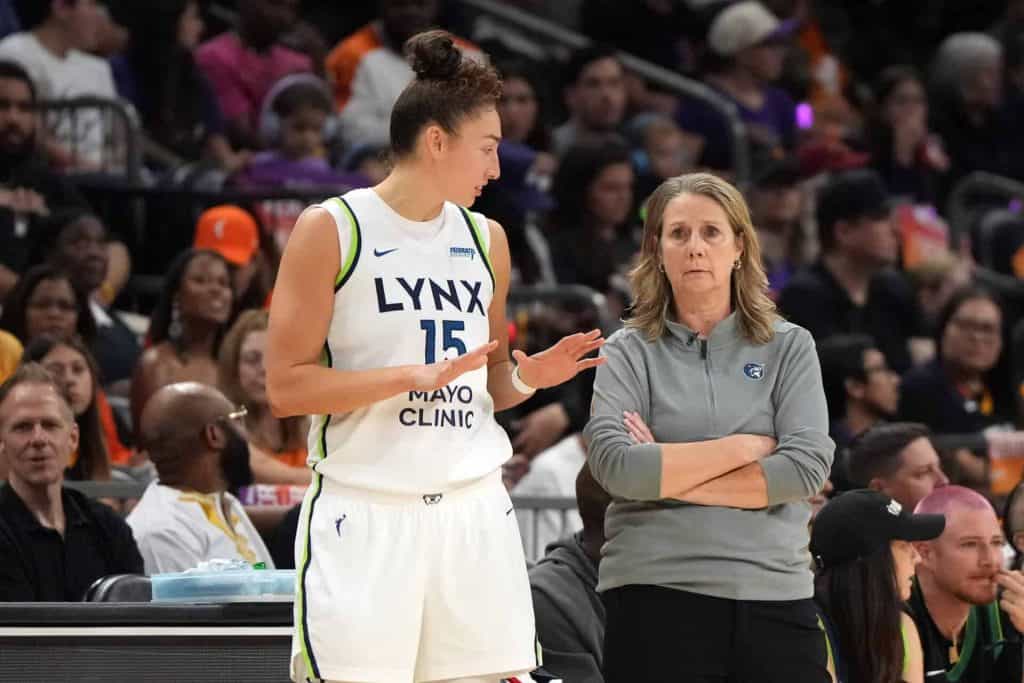 Jessica Shepard Most Improved winner, then with the Minnesota Lynx, talks with coach Cheryl Reeve during the 2025 WNBA playoffs