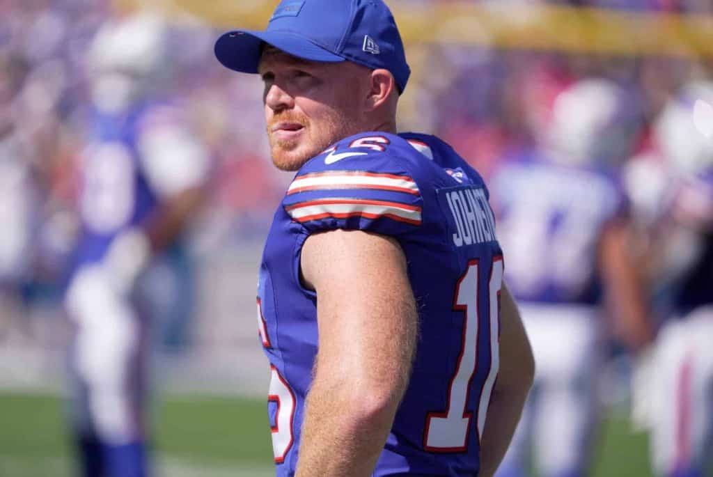 Buffalo Bills punter Cameron Johnston watches the game during first half action of the Bills home game against the New