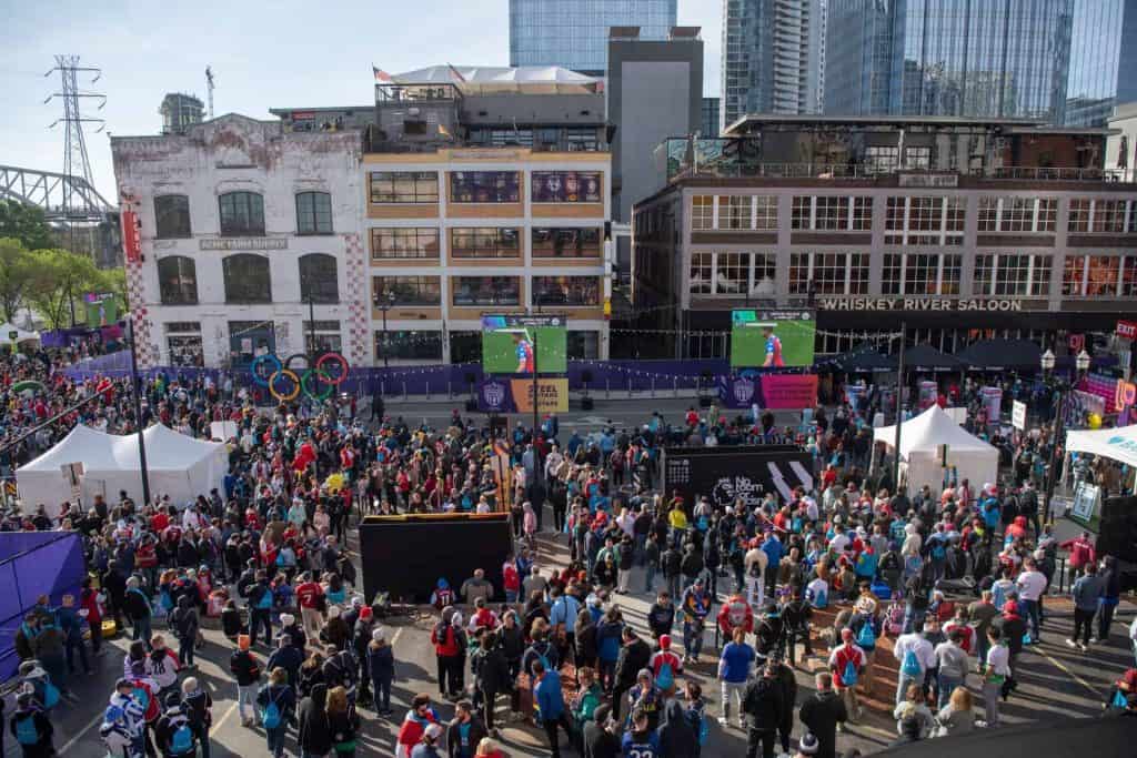 Fans gather to watch English Premier League soccer during Premier League Fan Fest, off Broadway at Riverfront Park in
