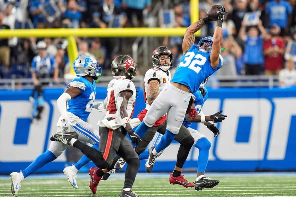 Detroit Lions safety Brian Branch (32) intercepts a pass intended for Tampa Bay Buccaneers wide receiver Chris Godwin (14)
