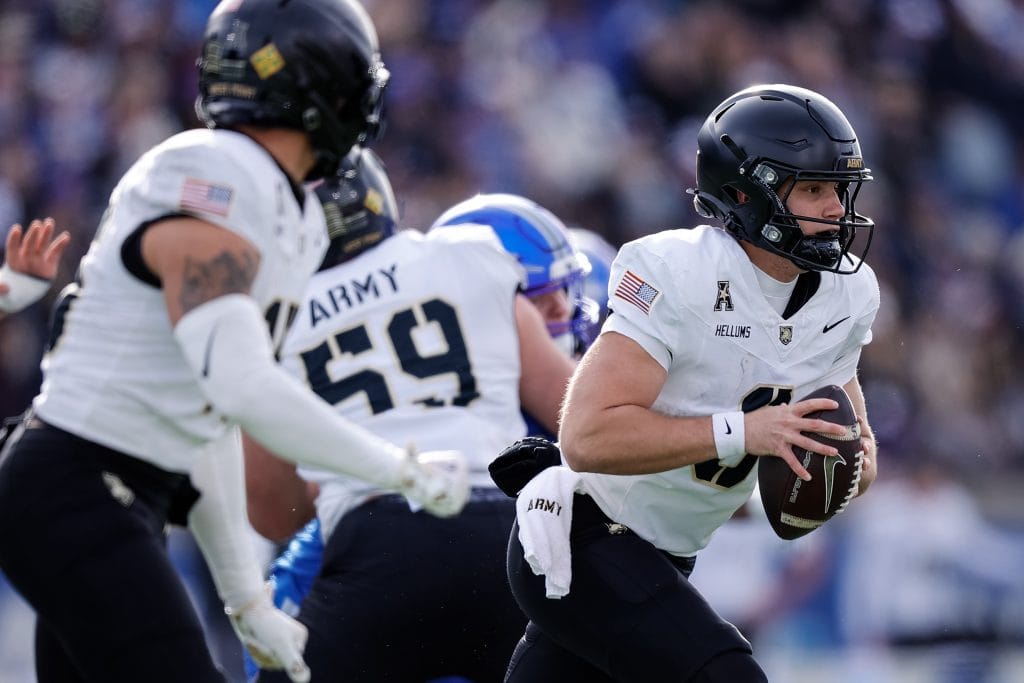 Army West Point Black Knights quarterback Cale Hellums (3) scrambles with the ball in the first quarter against the Air Force Falcons at Falcon Stadium. Image by: Isaiah J. Downing-Imagn Images