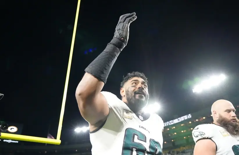 Eagles Jordan Mailata and Lane Johnson walking off Lambeau Field