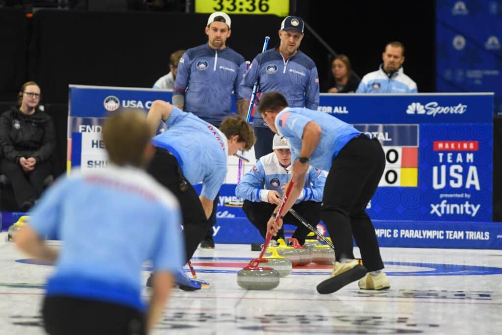 Team Casper sweeps the stone into their house during the first day of the U.S. Olympic Curling Team Trials on Tuesday, Nov.