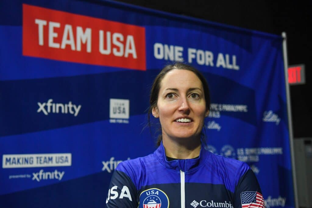 Tabitha Peterson, from Team Peterson, talks with press after competing on the ice during the U.S. Olympic Team Trials on