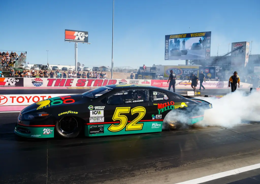 Oct 27, 2017; Las Vegas, NV, USA; NHRA pro stock driver Deric Kramer does a burnout in his Days of Thunder themed car driven by character Cole Trickle during qualifying for the Toyota National at The Strip at Las Vegas Motor Speedway. Mandatory Credit: Mark J. Rebilas-Imagn Images