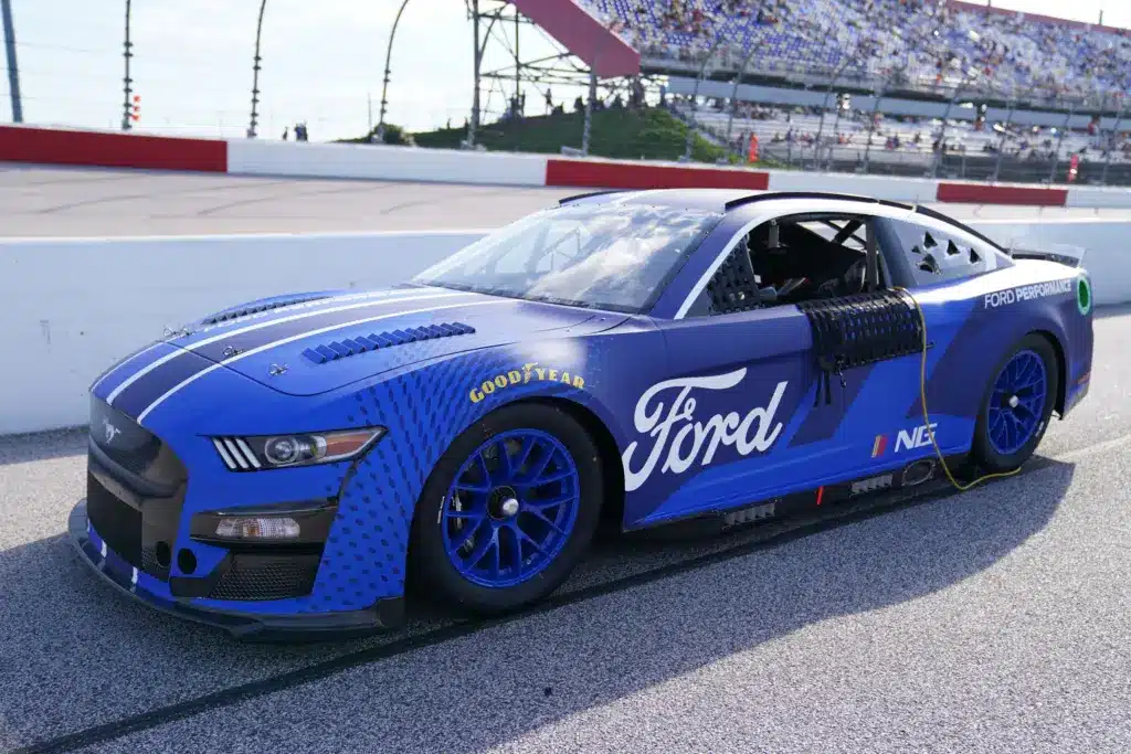 Sep 5, 2021; Darlington, South Carolina, USA; A general view of the 2022 Next Gen Ford Mustang race car on the grid prior to the Cook Out Southern 500 at Darlington Raceway. Mandatory Credit: Jasen Vinlove-Imagn Images