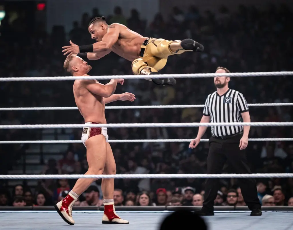 SmackDown; Caption: Carmelo Hayes, right, goes airborne against Ilja Dragunov.