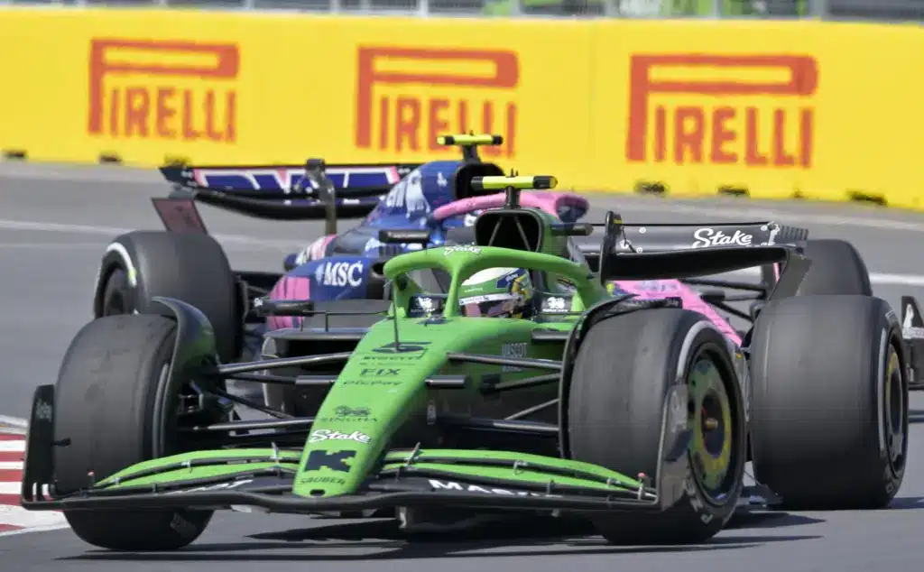 Jun 15, 2025; Montreal, Quebec, Canada; Kick Sauber driver Gabriel Bortoleto (5) and Alpine driver Jack Doohan (7) race during the F1 Montreal Grand Prix at Circuit Gilles-Villeneuve. Mandatory Credit: Eric Bolte-Imagn Images