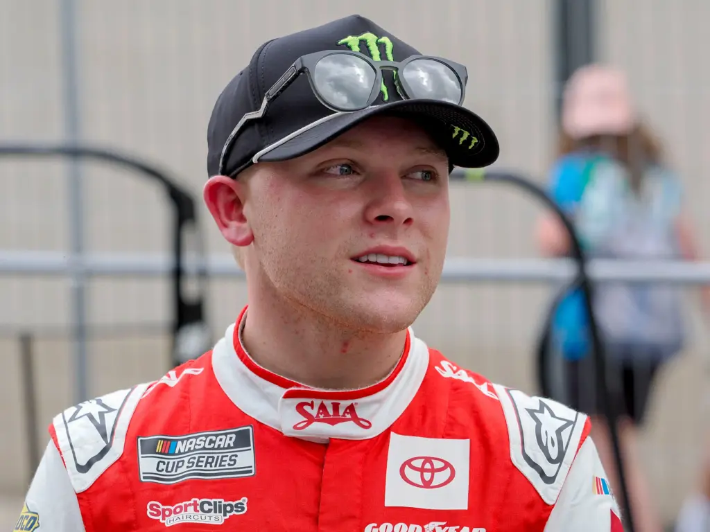 NASCAR Cup Series driver Ty Gibbs (54) talks with fans Friday, July 25, 2025, ahead of practice at Indianapolis Motor Speedway in preparation for the Brickyard 400. Cup practice was cancelled due weather in the area.