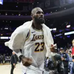 LeBron James offense creator role: James in a Lakers uniform at Philadelphia in December 2025