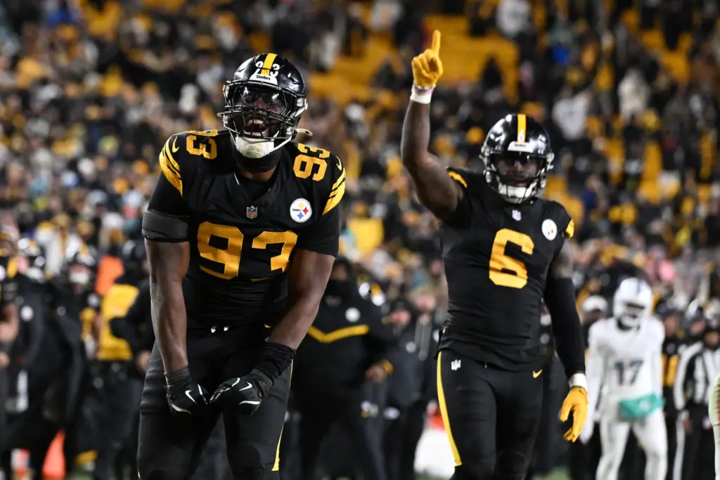 Dec 15, 2025; Pittsburgh, Pennsylvania, USA; Pittsburgh Steelers defensive end Esezi Otomewo (93) celebrates after a defensive stop in the fourth quarter against the Miami Dolphins at Acrisure Stadium.