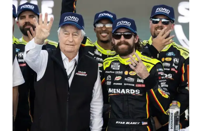 Nov 2, 2025; Avondale, Arizona, USA; NASCAR Cup Series driver Ryan Blaney (right) celebrates with team owner Roger Penske after winning the NASCAR Championship race at Phoenix Raceway. Ford Racing