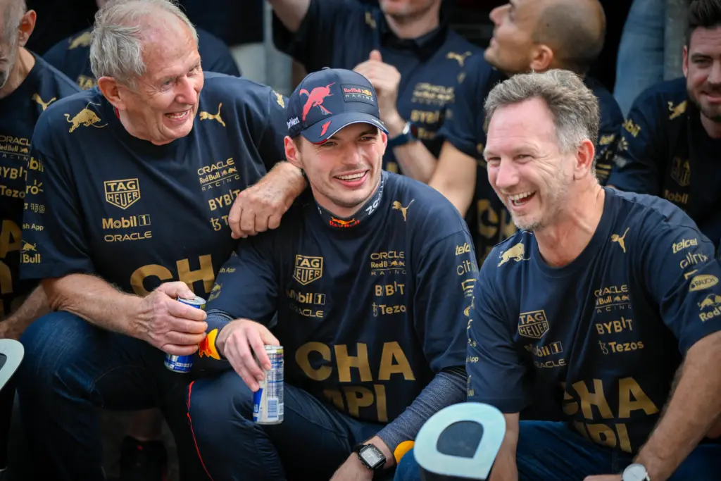 Oct 23, 2022; Austin, Texas, USA; (from left) Red Bull team advisor Helmut Marko and Red Bull Racing Limited driver Max Verstappen of Team Netherlands and Team Principal Christian Horner celebrate winning the U.S. Grand Prix F1 race at Circuit of the Americas. Mandatory Credit: Jerome Miron-Imagn