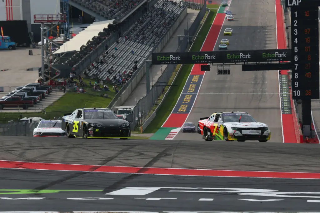 Garrett Smithley; Mar 23, 2024; Austin, Texas, USA; NASCAR Xfinity driver Alex Labbe (35) and driver Justin Allgaier (7) during the Focused Health 250 at Circuit of the Americas. Mandatory Credit: Michael C. Johnson-Imagn Images