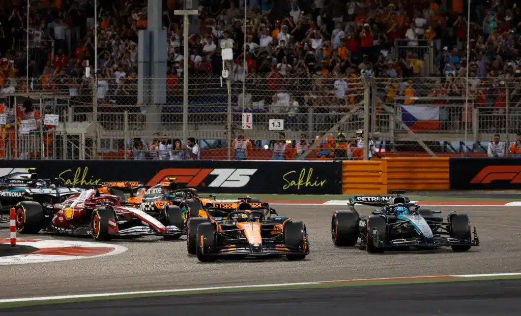 Barretto; [US, Mexico & Canada customers only] April 13, 2025; Sakhir, BAHRAIN; Oscar Piastri leads George Russell into the first corner at the start of the race during the F1 Bahrain Grand Prix at the Bahrain International Circuit. Mandatory Credit: Rula Rouhana/Reuters via Imagn Images