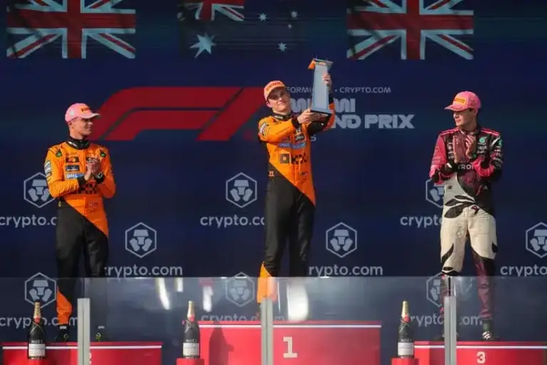 May 4, 2025; Miami Gardens, FL, USA; McLaren driver Oscar Piastri (81) celebrates at the podium after winning the F1 Miami Grand Prix at Miami International Autodrome.