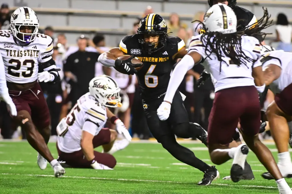 Southern Miss Golden Eagles wide receiver Micah Davis (6) runs the ball against the Texas State Bobcats at M.M. Roberts Stadium in Hattiesburg,Miss, on Nov. 15, 2025.
