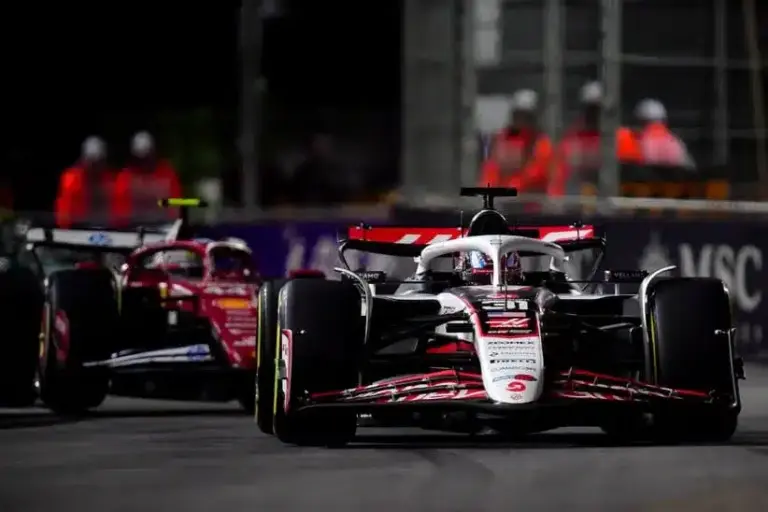 Nov 21, 2025; Las Vegas, NV, USA; Haas F1 Team driver Esteban Ocon (31) leads Ferrari driver Lewis Hamilton (44) during the Las Vegas Grand Prix at Las Vegas Strip Circuit.