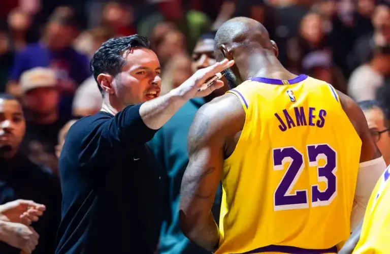 LeBron James and "head coach" JJ Redick speaking on sidelines of game, Rich Paul