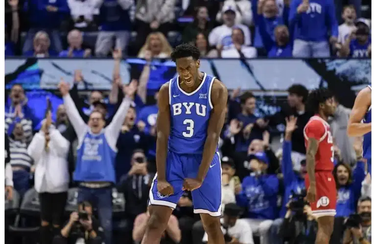 BYU Freshman forward AJ Dybantsa celebrates in the second half vs Utah