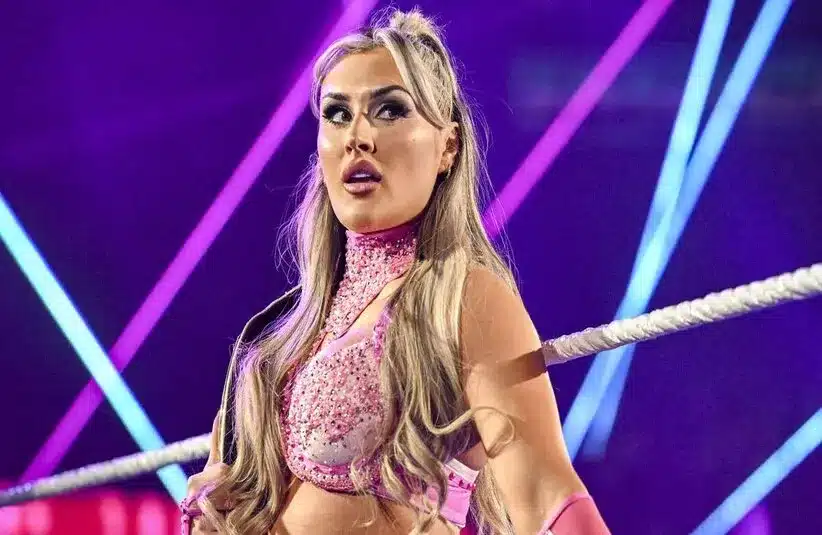 Tiffany Stratton Posing At Ringside With Pick Attire At WWE Show