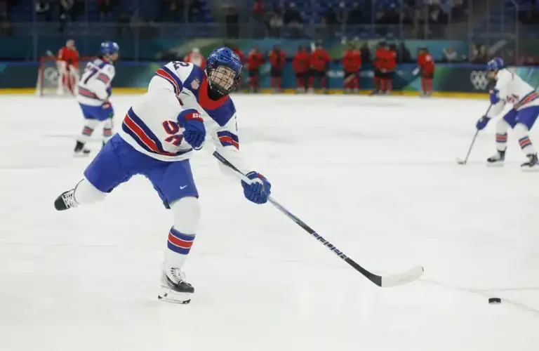 Caption: February 10, 2026; Milan, Italy; Tessa Janecke (22) of the United States warms up before playing against Canada in women's ice hockey group A play during the Milano Cortina 2026 Olympic Winter Games at Milano Santagiulia Ice Hockey Arena.