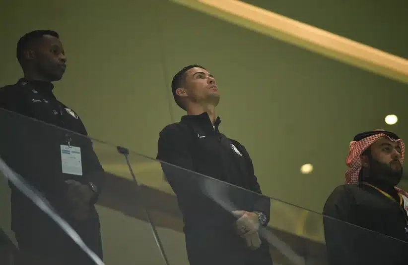 Ronaldo watches on from the dressing room