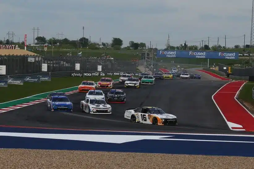 Mar 23, 2024; Austin, Texas, USA; NASCAR Xffinity Series driver AJ Allmendinger (16) leads the field during the Focused Health 250 at Circuit of the Americas.