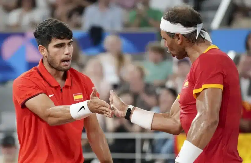Alcaraz alongside Nadal
