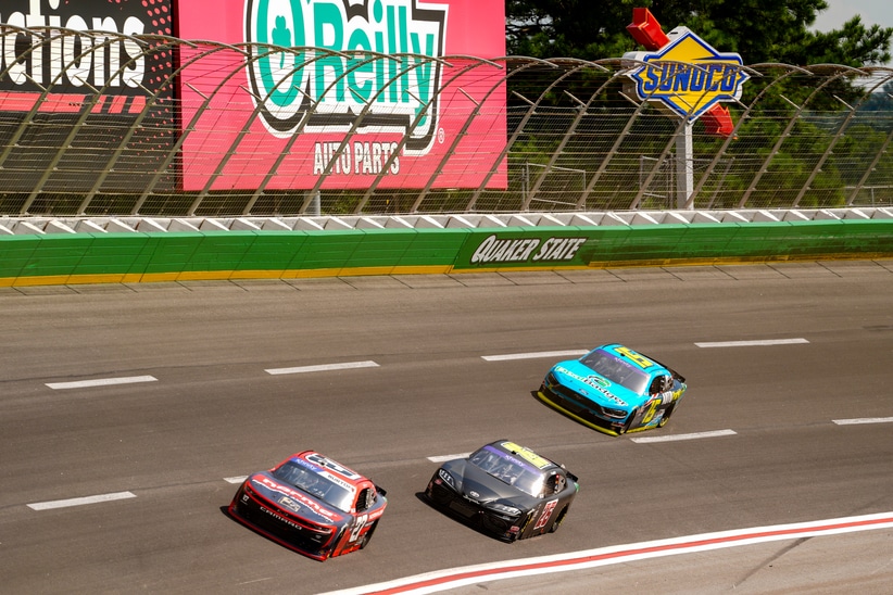 Sep 7, 2024; Hampton, Georgia, USA; Xfinity Series driver Jeb Burton (27) leads drivers into turn four at Atlanta Motor Speedway.