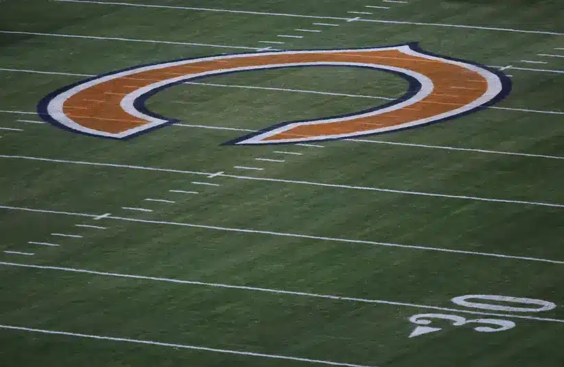 Chicago Bears logo at midfield before a game against the Seattle Seahawks at Soldier Field. JB Pritzker