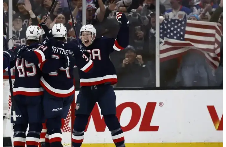 The United States hockey team celebrating a goal