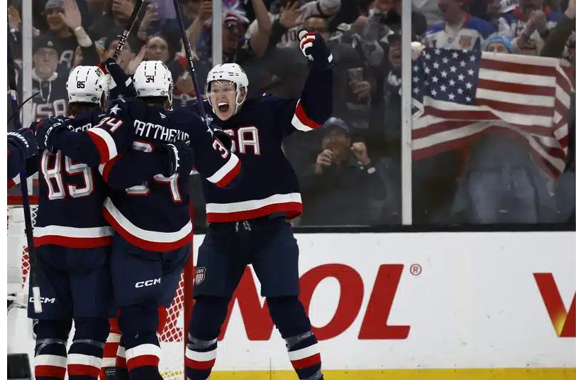 The United States hockey team celebrating a goal