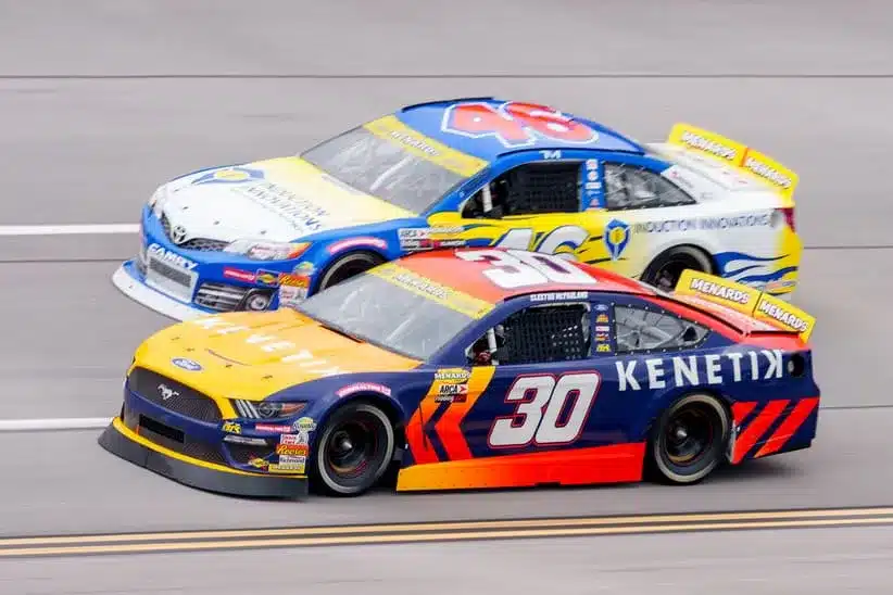Niece Motorsports; Apr 26, 2025; Talladega, Alabama, USA; ARCA Series driver Cleetus McFarland (30) pulls ahead of ARCA Series driver Thad Moffitt (46) during the General Tire 200 at Talladega Superspeedway.