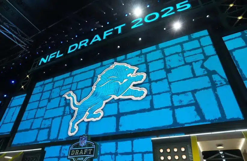 The Detroit Lions logo is projected on the video board, Jack Campbell