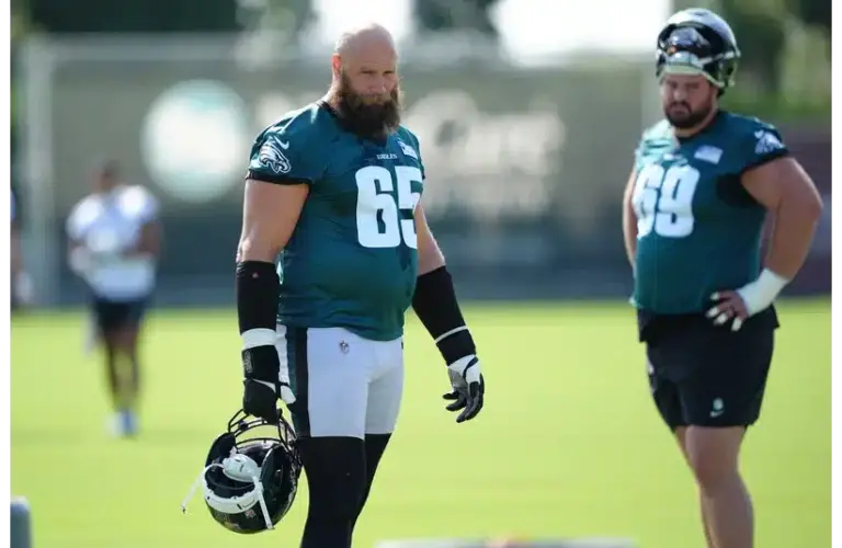 Eagles Lane Johnson and Landon Dickerson Annoucning They'll come back in 2026, are pictured here in 2025 training camp.