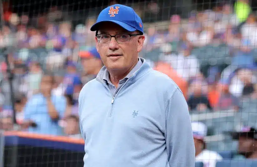 New York Mets owner Steve Cohen stands on the field before a ceremony