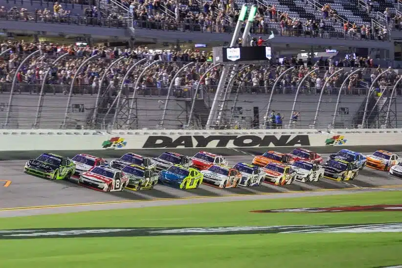 Aug 22, 2025; Daytona Beach, Florida, USA; Drivers get the green flag to start the Wawa 250 at Daytona International Speedway.