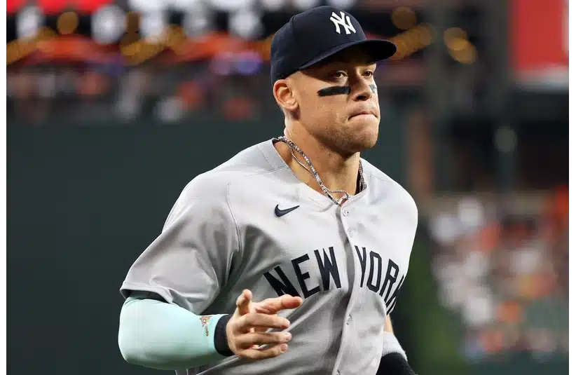 Aaron Judge runs off of the field, Shohei Ohtani
